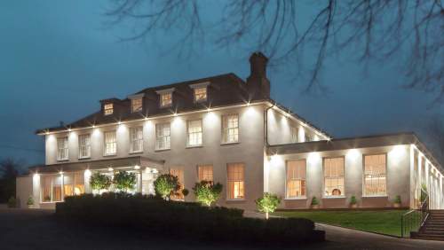 The Pheasant Hotel exterior dusk