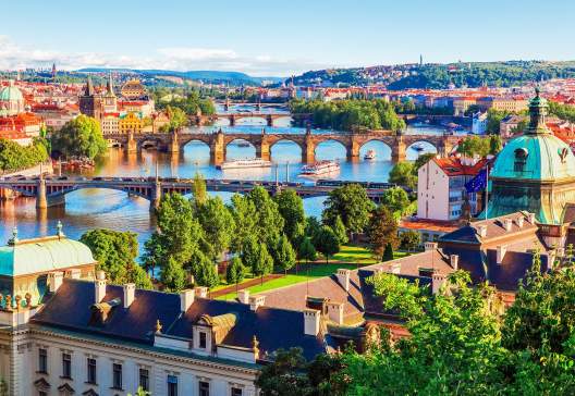 Old-Town-pier-architecture-and-Charles-Bridge-over-Vltava-river-in-Prague