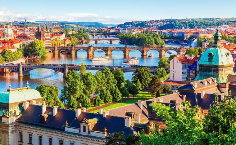 Old-Town-pier-architecture-and-Charles-Bridge-over-Vltava-river-in-Prague