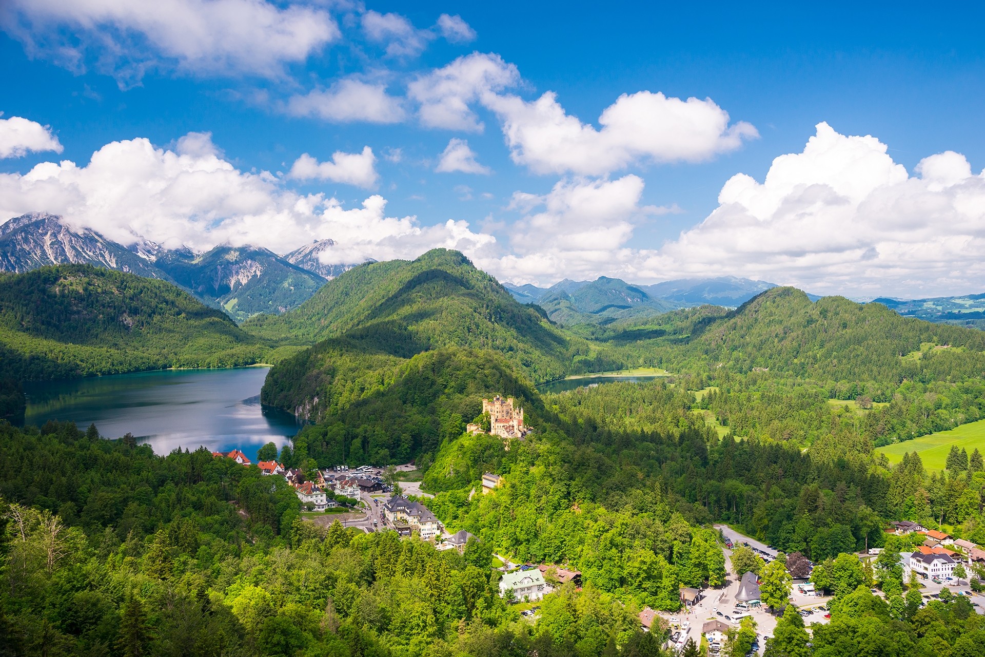 Castle-Hohenschwangau-eternal-forest-with-blue-mountains-and-lakes-of-Bavaria-Germany