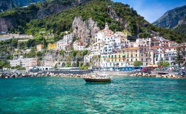 Colorful-sunny-Amalfi-town-landmark-on-Italy-Positano-coast