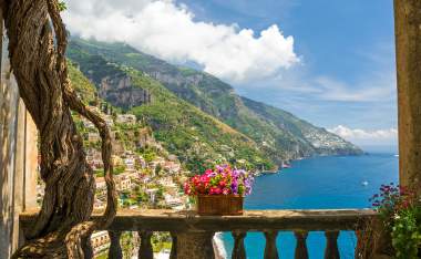 Positano-from-antique-terrace-with-flowers-Amalfi-coast-Italy.-balcony-with-flowers