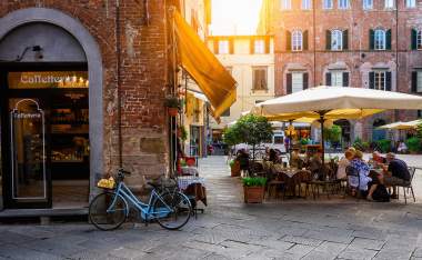 Old-cozy-street-in-Lucca-Italy.-Lucca-is-a-city-and-comune-in-Tuscany.-It-is-the-capital-of-the-Province-of-Lucca