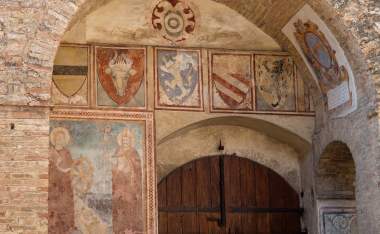 Old-frescoes-on-a-walls-in-the-town-hall-of-San-Gimignano