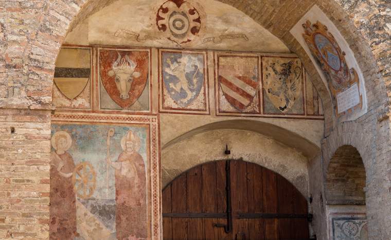 Old-frescoes-on-a-walls-in-the-town-hall-of-San-Gimignano