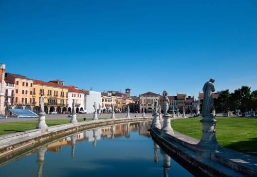 View-of-the-canal-with-statues-on-Prato-della-Valle-in-Padova-Veneto-Italy