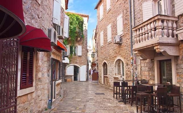 View-narrow-street-in-old-district-of-Budva-Montenegro