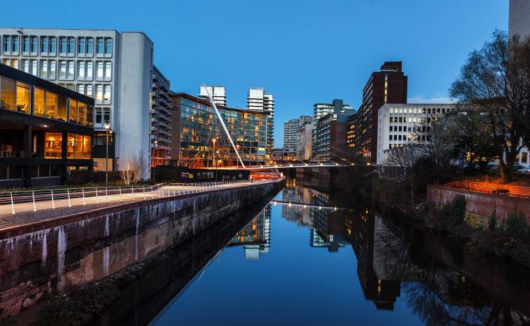 Urban landscape of Manchester and River Irwell passing through Manchester city centre